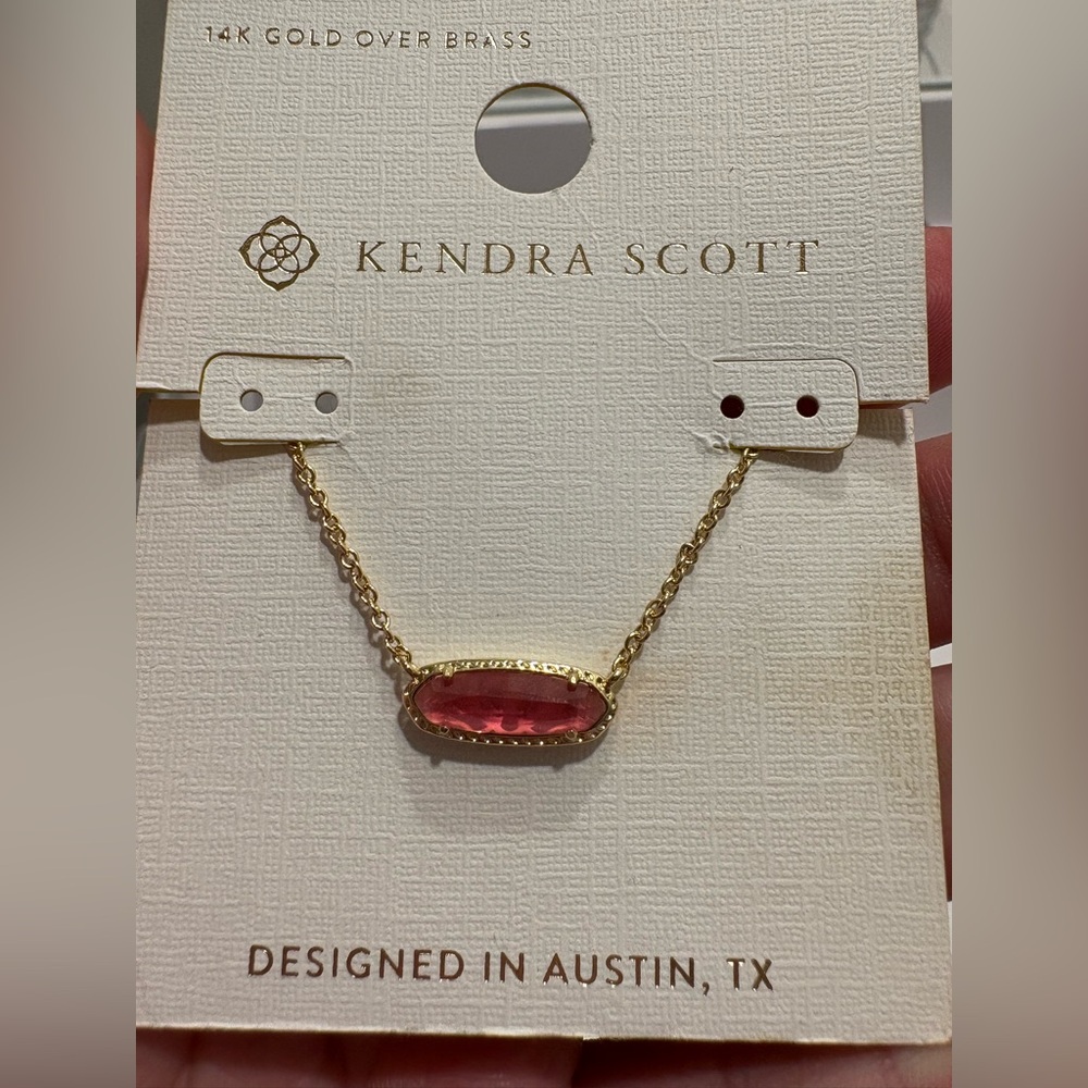 Kendra Scott pendant necklace gold with pink pendant